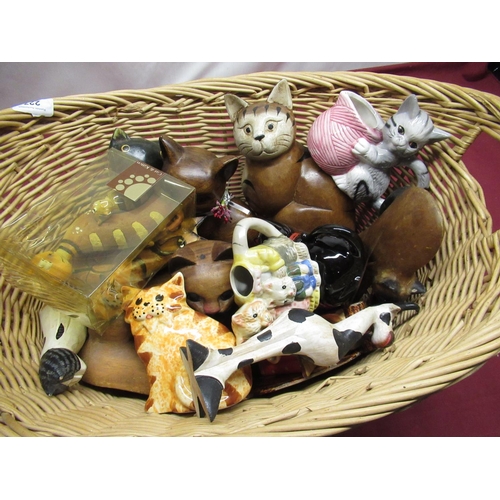 227 - Collection of cat figures in a wicker basket