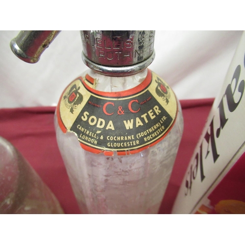 233 - Four soda siphons