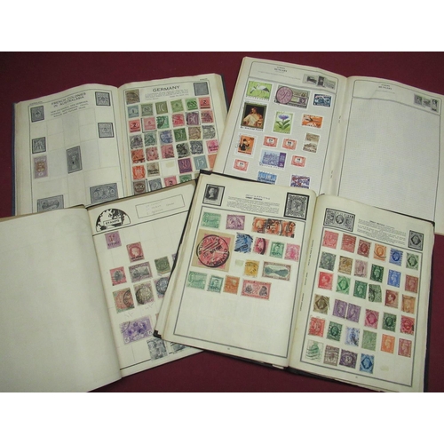 144 - Four albums of mixed world stamps including GB and some interesting early material (4)