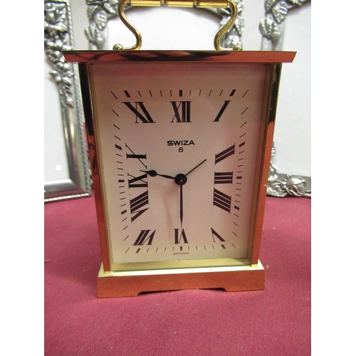 108 - Large Swiza eight day brass cased carriage clock alarm, H14cm including handle, smaller Swiza lacque... 