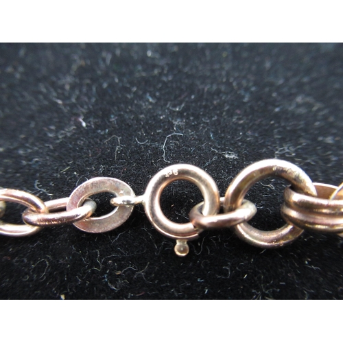 12 - 9ct rolled rose gold articulated bracelet with bright cut decoration, 12.3g