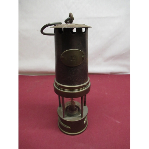 154 - Brass and steel miners safety lamp marked 19, H27cm