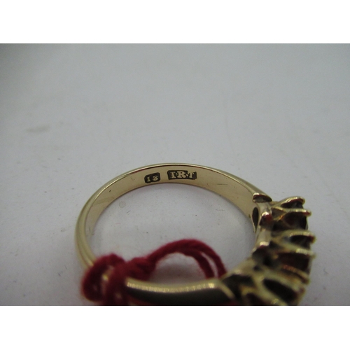 5 - 18ct yellow gold three stone garnet ring, stamped 18, I.R.T, size M, 3.9g