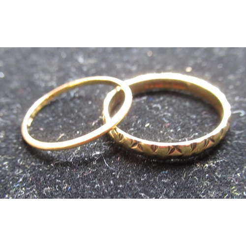 63 - Hallmarked 18ct yellow gold ring by MS&S, 750, London, 1975, size O, with bright cut decoration, 2.4... 