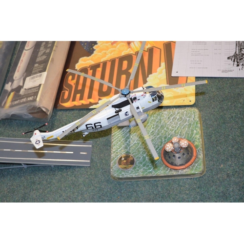 34 - Large collection of models and ephemera relating to space flight. 
Please note the Corgi Sea King ha... 
