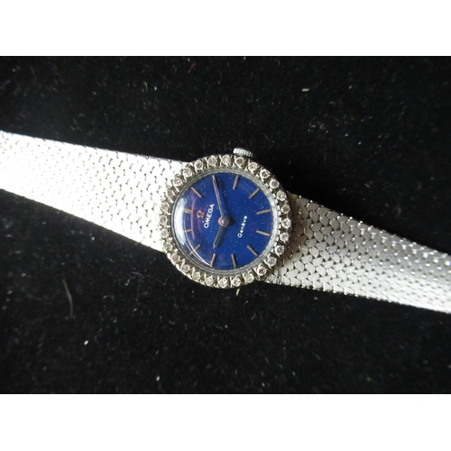 1120 - Late 1960s Ladies Omega Geneve white metal and diamond cocktail watch. Integral case and bracelet, c... 