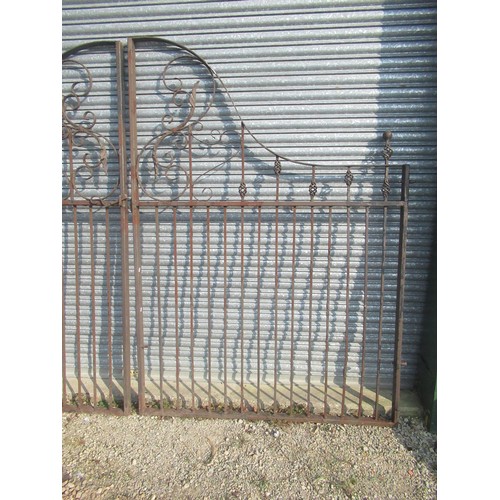 1601 - Large pair of arched cast and wrought iron driveway gates, with leaf and pierced decoration, W305cm ... 