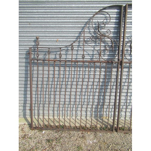 1601 - Large pair of arched cast and wrought iron driveway gates, with leaf and pierced decoration, W305cm ... 