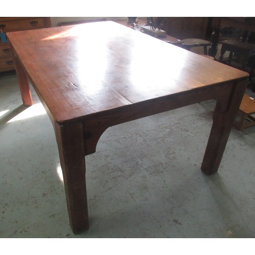 1513 - Large Victorian pitch pine kitchen table, rounded rectangular top with shaped frieze on faceted squa... 