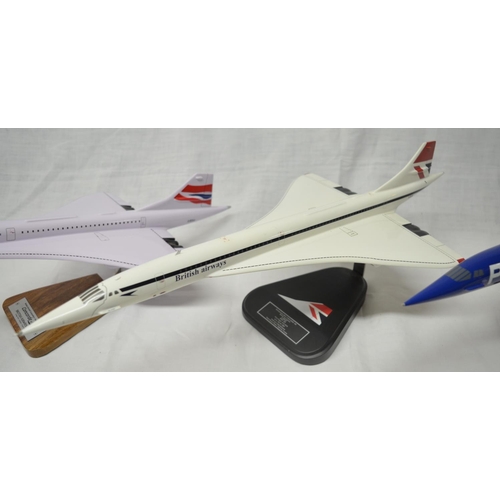 16 - Four 1/100 Concorde models, 3 with stands. These are hand crafted kiln dried wood models from Gtrans... 
