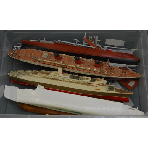 49 - Opened plastic ship model kits including Queen Mary, Titanic etc, number of started built and damage... 
