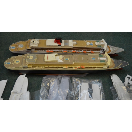 49 - Opened plastic ship model kits including Queen Mary, Titanic etc, number of started built and damage... 