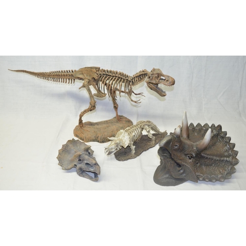 79 - Resin T-Rex model, large Triceratops wall hanging skull by D.W.K, another smaller Triceratops skull ... 