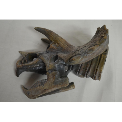 79 - Resin T-Rex model, large Triceratops wall hanging skull by D.W.K, another smaller Triceratops skull ... 