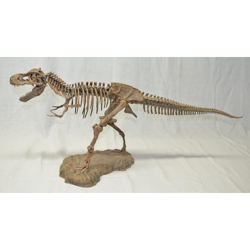 79 - Resin T-Rex model, large Triceratops wall hanging skull by D.W.K, another smaller Triceratops skull ... 