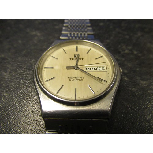 83 - Tissot Seastar quartz wristwatch with day date, stainless steel case on original stainless steel Tis... 