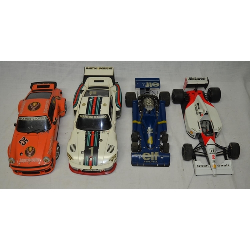 59 - Four Tamiya 1:12 scale static car models, F1 Tyrrell 6 wheeler, two Porsche etc (all A/F)