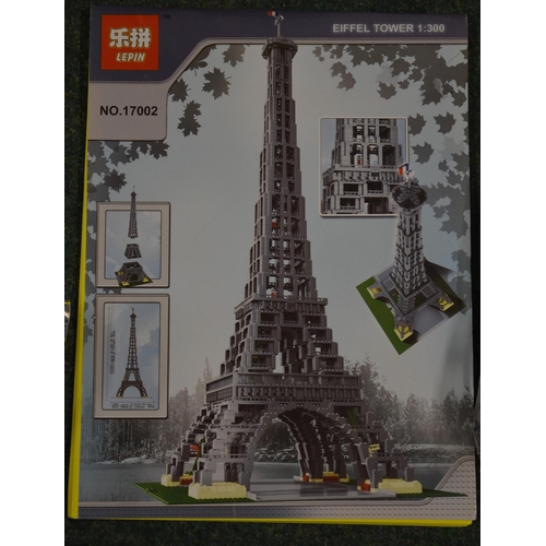 65 - Large Lego style model of the Eiffel Tower by Lepin 1:300 scale, all bags sealed, another smaller mo... 