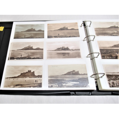 799 - Folder containing approximately two hundred postcards of Bamburgh Castle