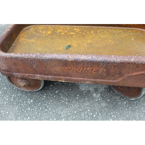 75 - Aircraiser pull along tin trolley on four wheels with rubber tyres (evidence of paintwork) L104cm W4... 