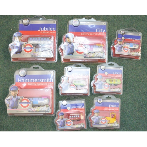 498 - London Underground Die-cast trains including pullback, battery and electric (8)