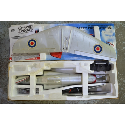 11 - Three radio controlled flying Hawk models, 1 in Red Arrows livery, the other 2 in silver grey. Model... 