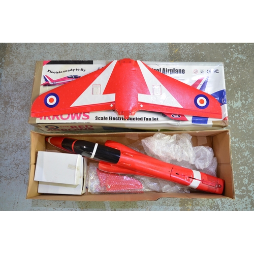 11 - Three radio controlled flying Hawk models, 1 in Red Arrows livery, the other 2 in silver grey. Model... 
