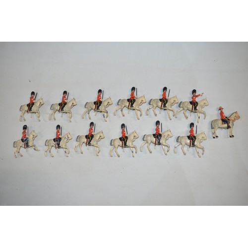 157o - 13 mounted Scots Guards, vintage metal figures by Britain’s.