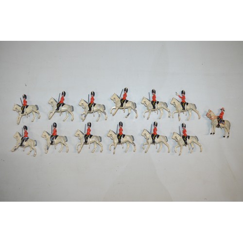 157o - 13 mounted Scots Guards, vintage metal figures by Britain’s.
