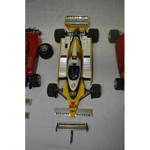 58 - Four Tamiya 1:12 scale F1 models (all A/F)