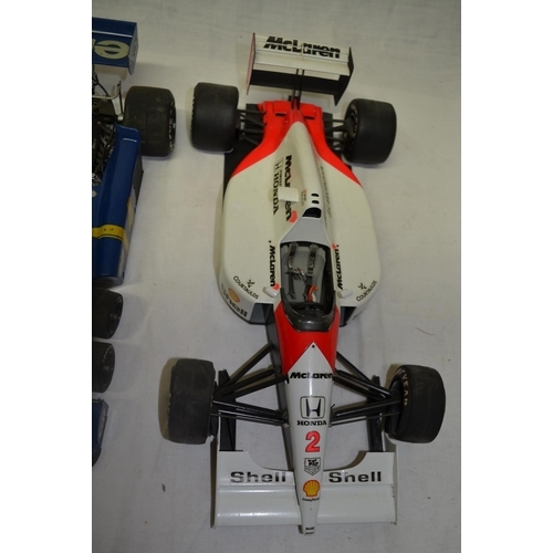 59 - Four Tamiya 1:12 scale static car models, F1 Tyrrell 6 wheeler, two Porsche etc (all A/F)