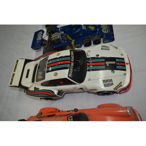 Four Tamiya 1:12 scale static car models, F1 Tyrrell 6 wheeler, two Porsche  etc (all A/F)