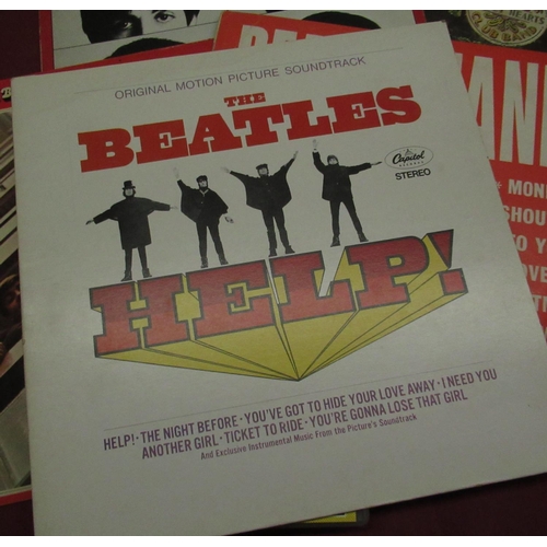 121 - Selection of various Beatles items including Beatles print by Johnathan Wood, two framed Beatles pho... 