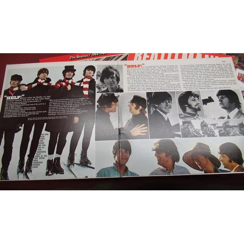 121 - Selection of various Beatles items including Beatles print by Johnathan Wood, two framed Beatles pho... 