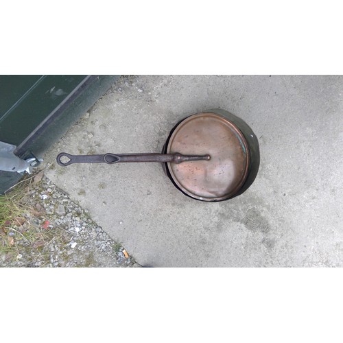 793 - Late C19th shallow copper saucepan with riveted wrought iron handle and matching copper lid D32cm