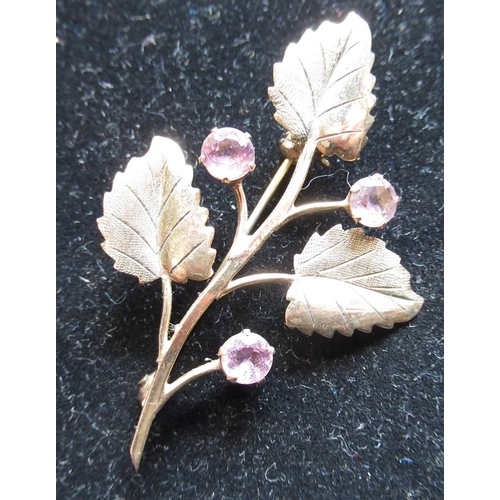 45 - Hallmarked 9ct yellow gold flower and leaf bar brooch with round cut, claw set lilac stones (maker k... 