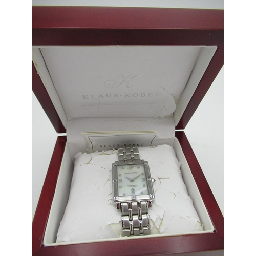 85 - Klaus-Kobec quartz wrist watch with date, mother of pearl dial, rectangular stainless steel case on ... 