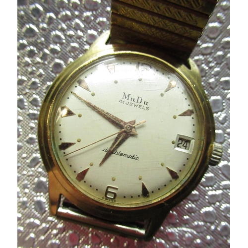 76 - Mudu Doublematic wristwatch with date, gold plated case on expanding bracelet, screw off stainless s... 