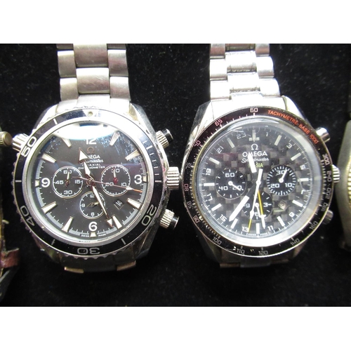 79 - Two automatic fashion watches and other quartz and mechanical wristwatches