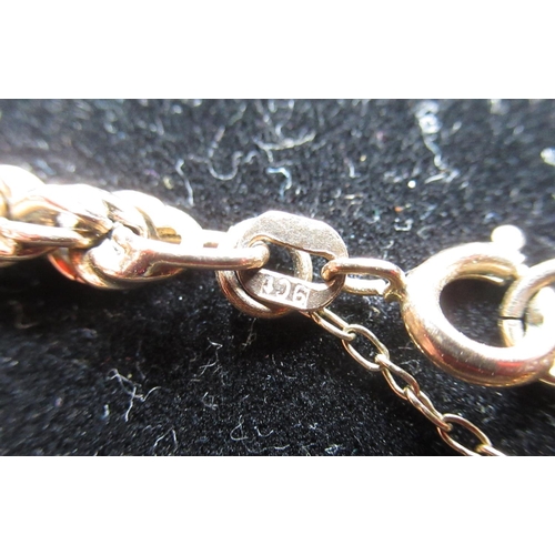 18 - 9ct yellow gold rope twist bracelet with safety chain and spring ring clasp stamped 9ct, L20cm, 4.8g
