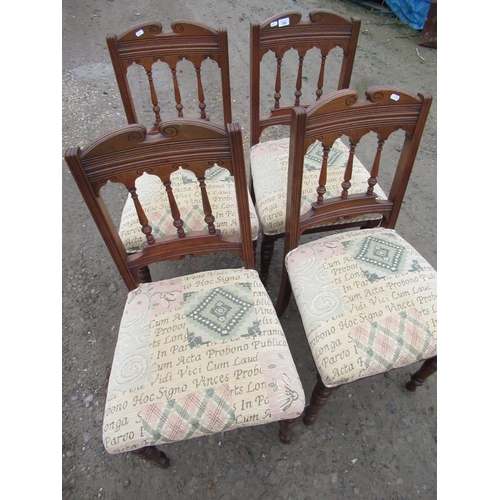 775 - Set of four oak dining chairs with upholstered seats and turned supports