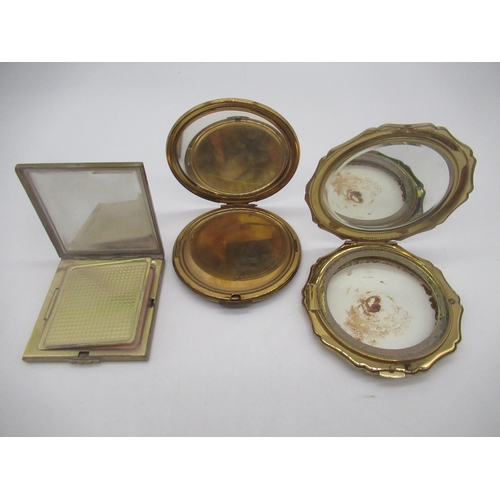 237 - Stratton tortoiseshell effect circular gilt compact Pat.764125, a similar square compact and another... 