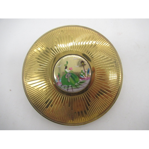240 - Circular compact, hand painted with a Lady with her parasol, another circular gilt compact with simi... 