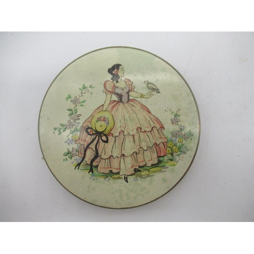 240 - Circular compact, hand painted with a Lady with her parasol, another circular gilt compact with simi... 