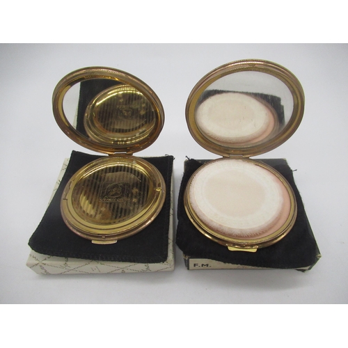 243 - Stratton compact with ballet dancing couples on brushed gilt metal complete with puff, and another S... 