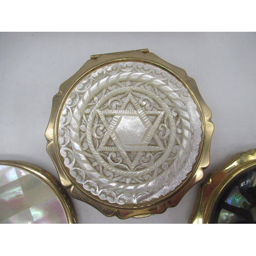 254 - Stratton compact with Star carved in mother of pearl cover, a Stratton compact with flowers etched i... 