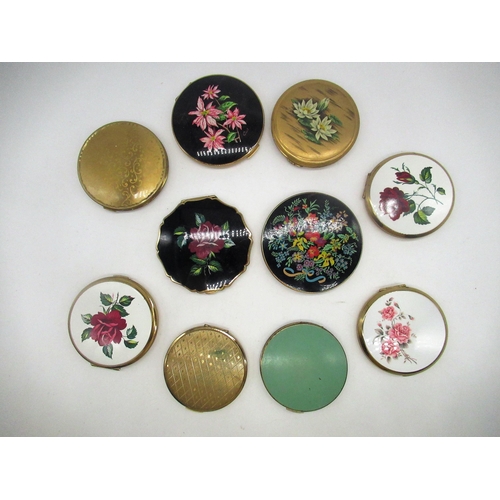 252 - Six Stratton compacts all with floral covers, a Vanity Fair compact with gilt cover, and three other... 
