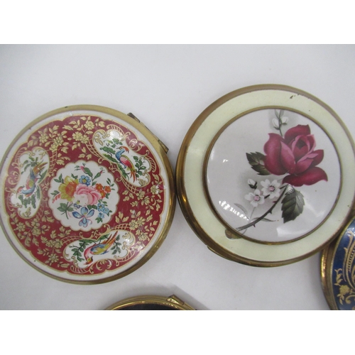 262 - Seven Stratton compacts with floral covers, a Melissa Compact with faux wood and floral cover and tw... 