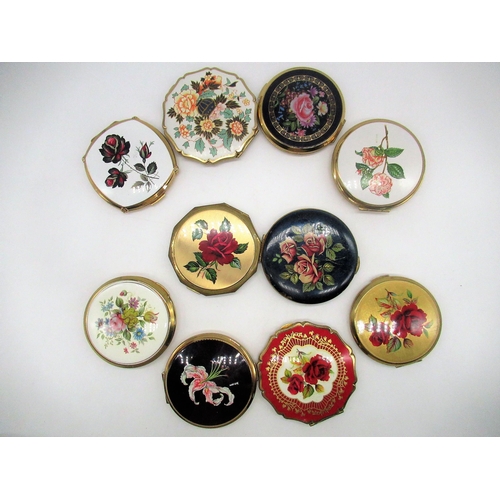 265 - Eight Stratton compacts with floral covers and two Kigu compacts with floral covers (10)