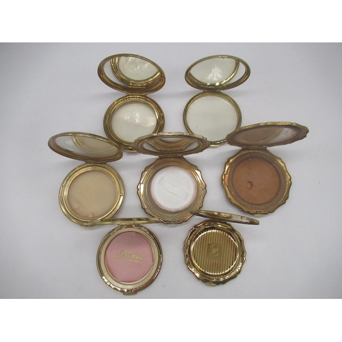 249 - Seven Stratton compacts with floral covers, a Kigu compact with floral cover and two other compacts ... 